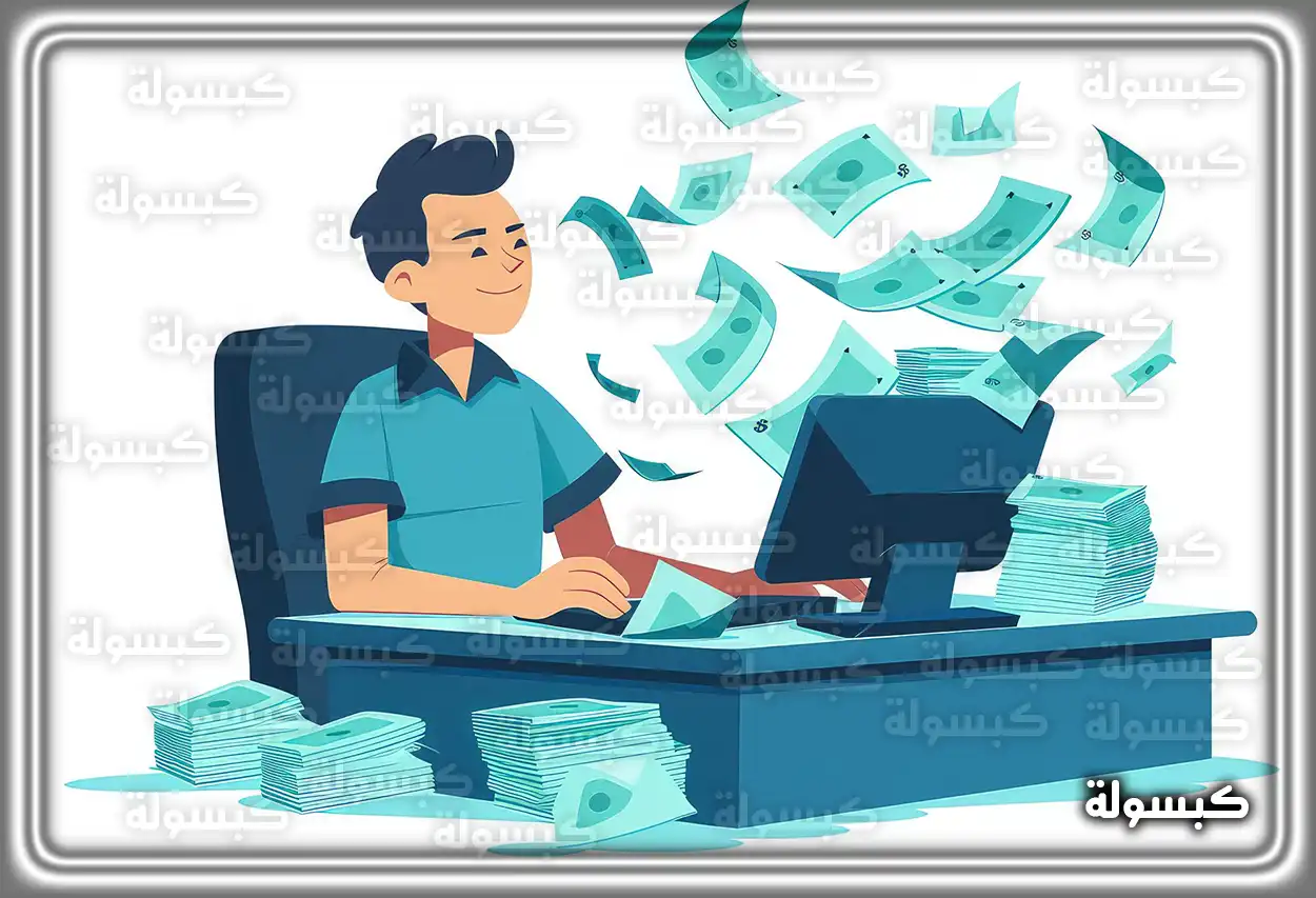 موظف يستخدم الحاسوب للاستعلام عن موعد نزول الراتب في السعودية